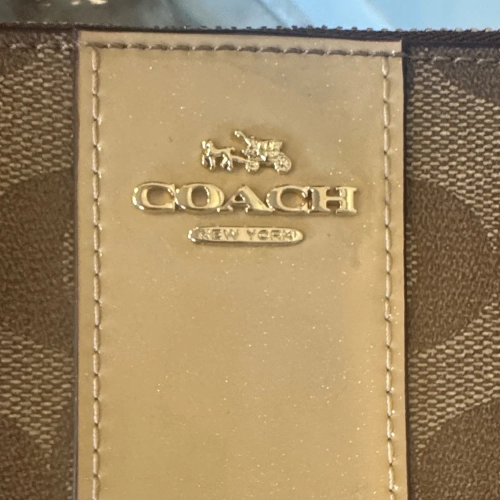 Coach Signature Brown and Tan Wristlet